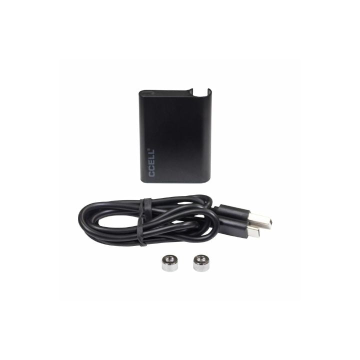 Black electronic component kit with cable and connectors on a white background