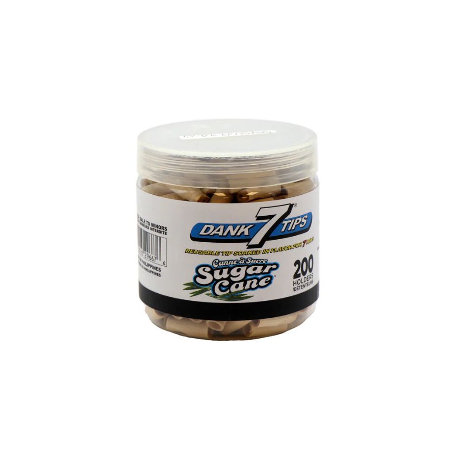 Jar of sugar cane tips with a label on a white background