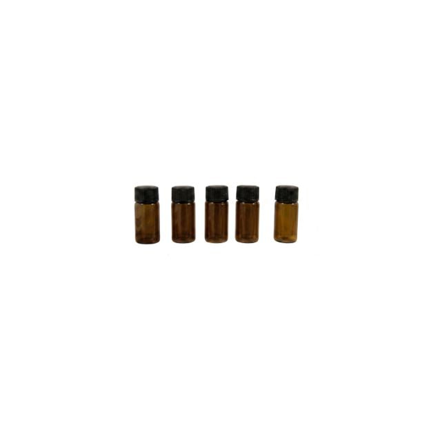 Set of six small amber glass bottles with black caps on a white background