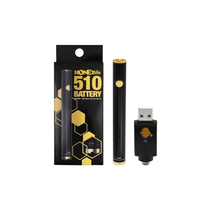Black and gold vape battery with packaging and USB adapter on a white background