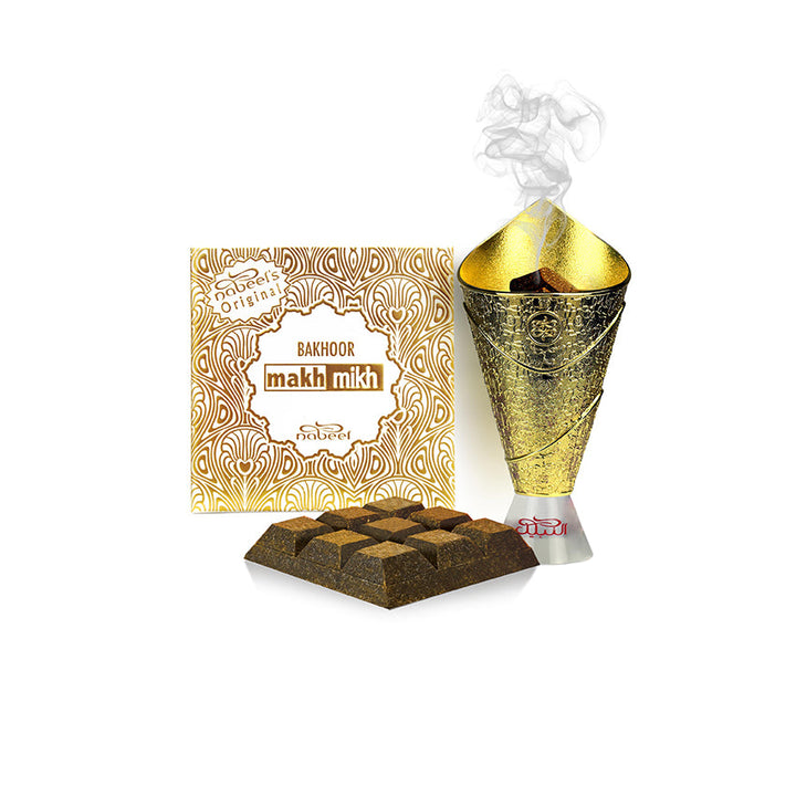 Makh Mikh bakhoor with packaging and burner on a white background