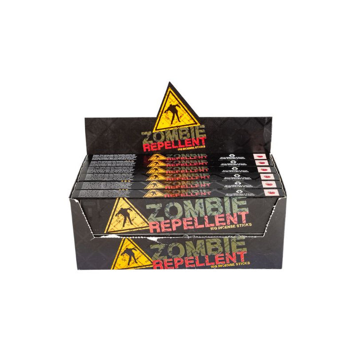 A display box of Zombie Repellent mosquito sticks on a plain white background. The packaging is black with a yellow warning triangle and red and white text.