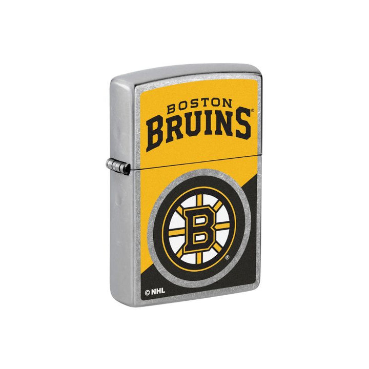 A Zippo silver metal lighter with a Boston Bruins NHL graphic on the front, featuring the team name in black on a yellow background and the Bruins logo below on a white background