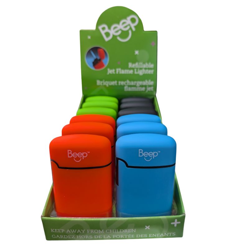 A retail display box of Beep brand refillable jet flame lighters, showing multiple color options including orange, blue, green, and gray in front of a green branded header card.