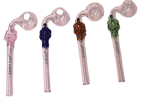 Five glass smoking accessories with colorful bowls on a light pink background
