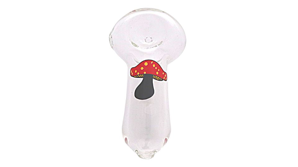 Glass smoking device with a mushroom design on a white background