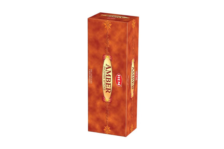 Box of Amber incense sticks on a white background