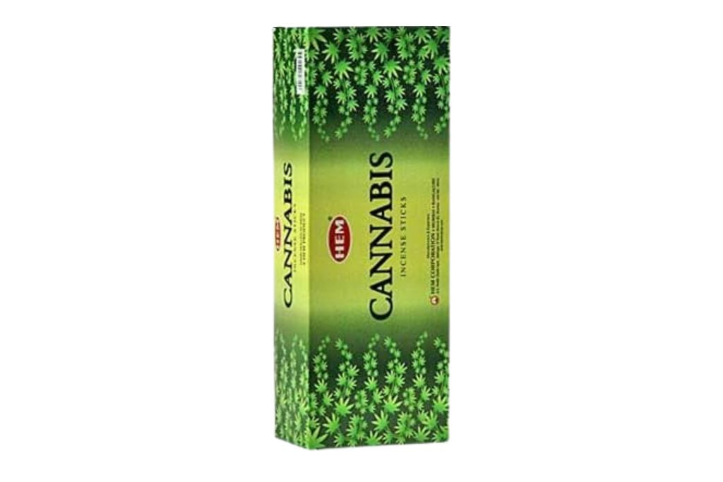 Pack of cannabis incense sticks with green design on a white background