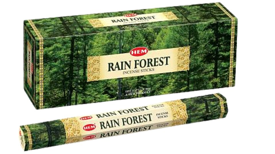 Box and incense sticks of Rain Forest HEM incense on a white background