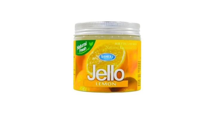Jar of lemon-flavored Jell-O on a white background