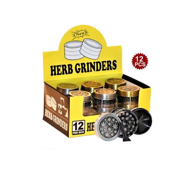 Box of herb grinders with a single grinder displayed in front on a white background