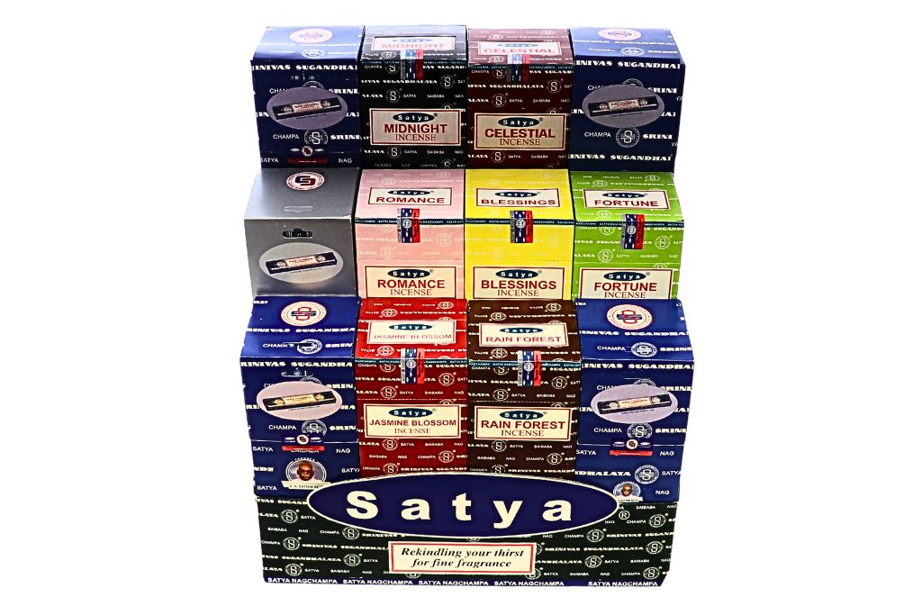 Stack of Satya incense boxes in various colors on a white background