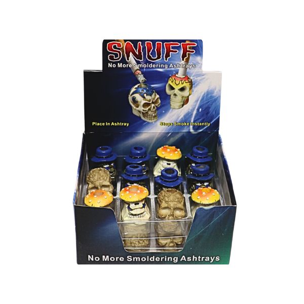 Display box of SNUFF skull-shaped ashtray stoppers with packaging text.