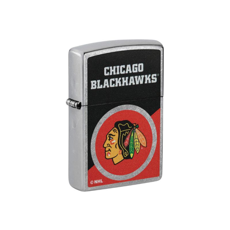 A silver Zippo metal lighter featuring the Chicago Blackhawks NHL logo, with a black top section displaying &