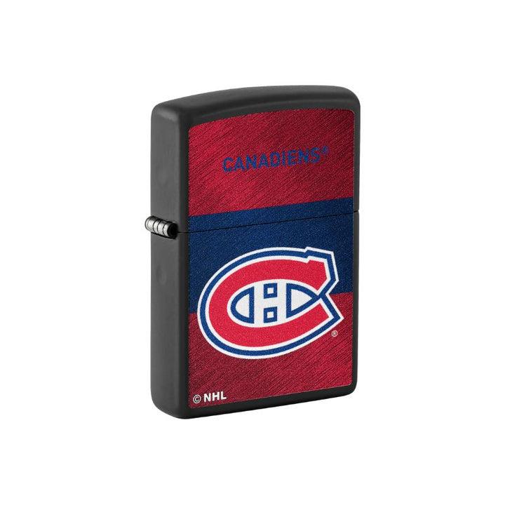 A black Zippo-style lighter with a textured red and blue Montreal Canadiens design on the front, featuring the team logo and NHL branding, set against a plain white background.